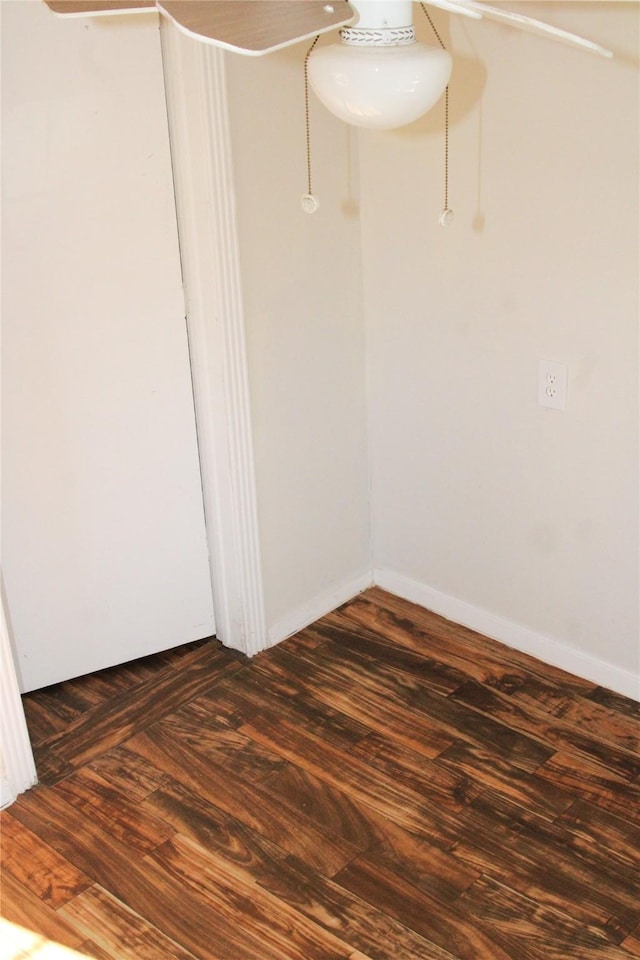 spare room featuring dark hardwood / wood-style flooring