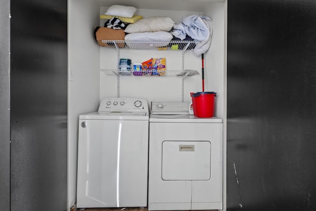 washroom with washer and clothes dryer