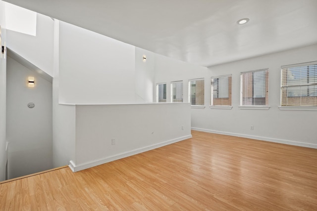 unfurnished room featuring light hardwood / wood-style floors