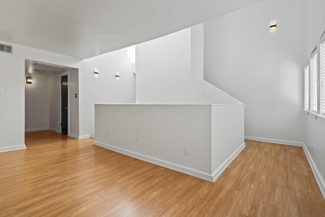 unfurnished living room with light hardwood / wood-style floors