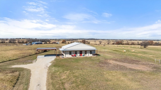 birds eye view of property featuring a rural view