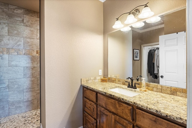 bathroom featuring vanity and walk in shower