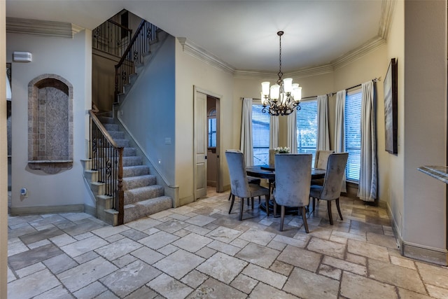 dining room with an inviting chandelier and crown molding