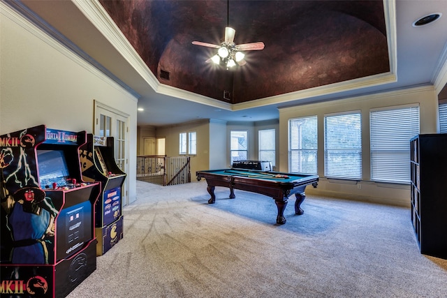 playroom featuring crown molding, carpet flooring, and a tray ceiling