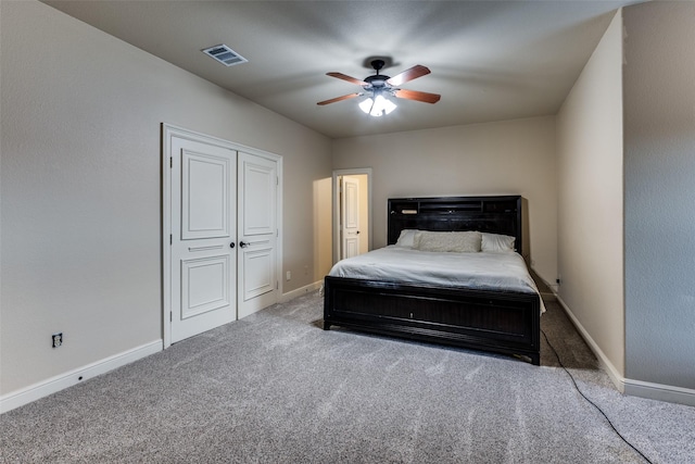 carpeted bedroom with ceiling fan