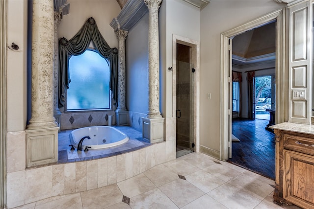 bathroom with tile patterned flooring, vanity, separate shower and tub, and a healthy amount of sunlight