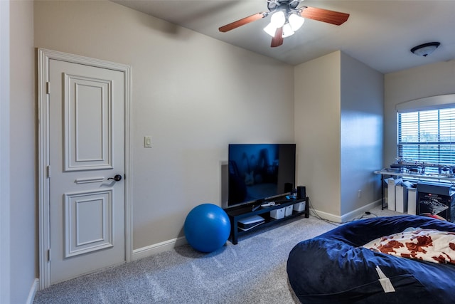 carpeted bedroom featuring ceiling fan