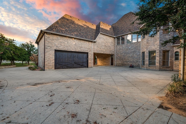 view of front of home with a garage