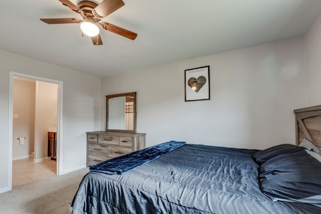 bedroom with light carpet and ceiling fan