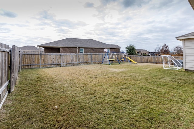 view of yard featuring a playground