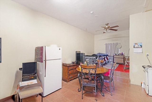 dining room featuring ceiling fan