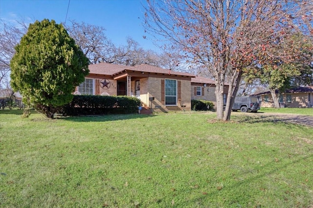 ranch-style house with a front yard