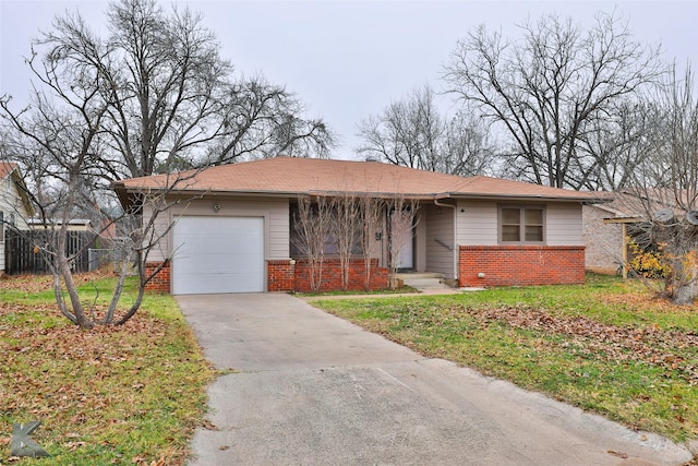 single story home with a garage and a front yard