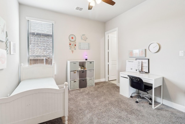 bedroom featuring ceiling fan and light carpet