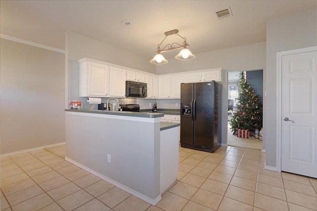 kitchen featuring white cabinetry, decorative light fixtures, kitchen peninsula, and black appliances