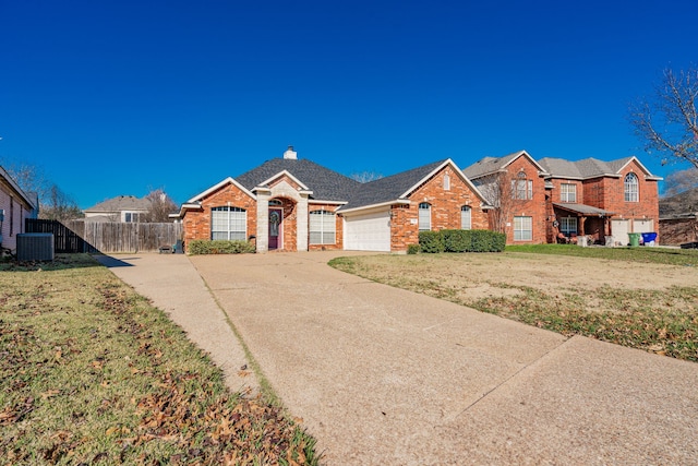 view of front of house with a garage, central air condition unit, and a front lawn