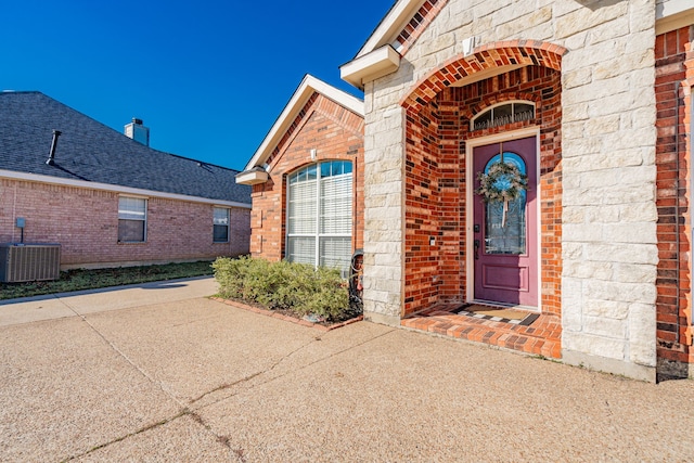 property entrance featuring cooling unit