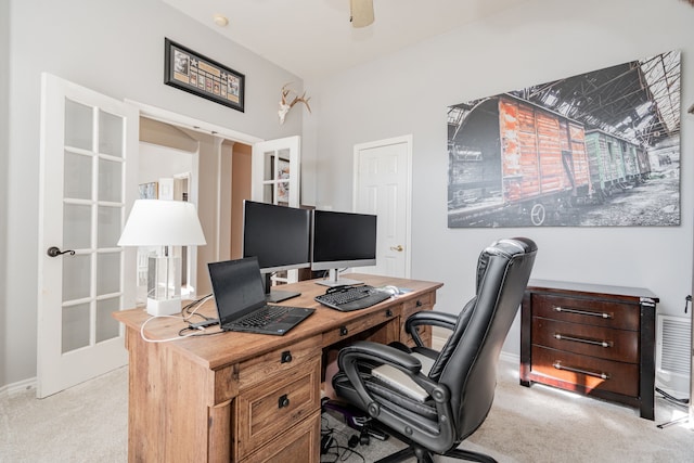 office space featuring ceiling fan, french doors, and light colored carpet