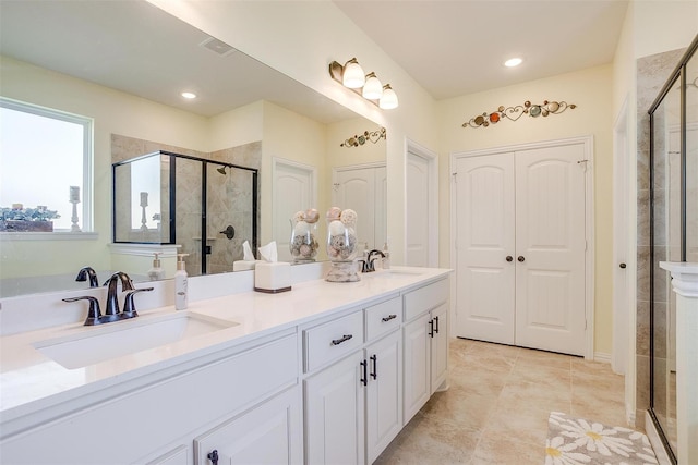 bathroom featuring vanity and walk in shower