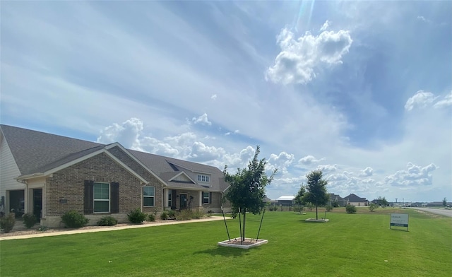 exterior space featuring a front lawn