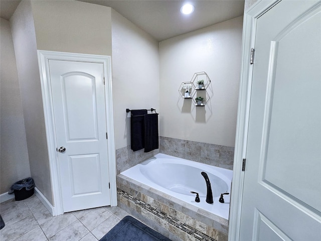 bathroom featuring tiled bath