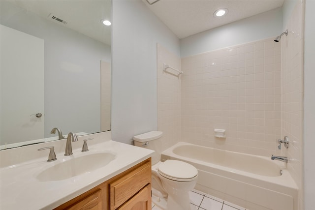 full bathroom with tile patterned flooring, vanity, toilet, and tub / shower combination