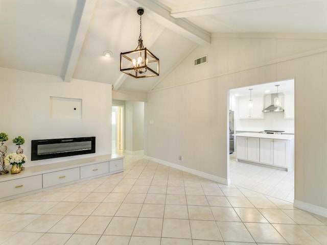 unfurnished living room with light tile patterned floors, vaulted ceiling with beams, and an inviting chandelier