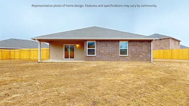 rear view of property featuring a patio area