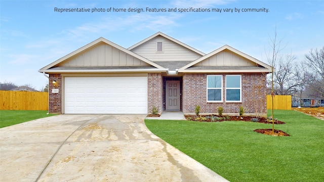 view of front of house with a garage and a front yard