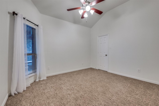 unfurnished room featuring ceiling fan, lofted ceiling, and light carpet