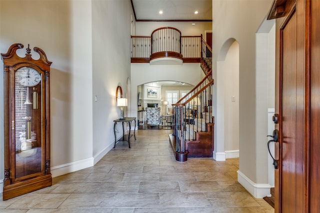 entrance foyer featuring a high ceiling