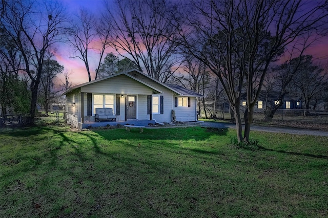 2230 Loy Lake Rd, Denison, TX 75020 - view of front of home with a lawn and covered porch