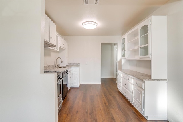 kitchen featuring white cabinets, dishwasher, and light stone countertops