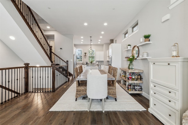 dining room with dark wood-type flooring