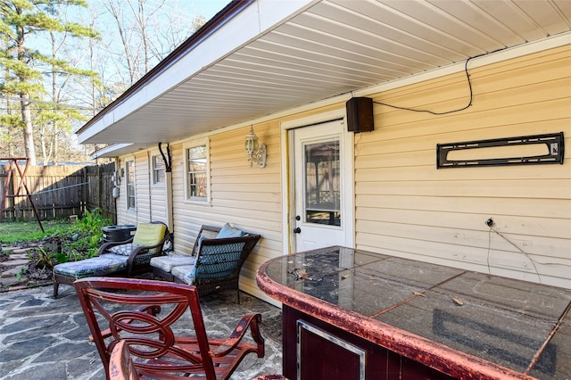 view of patio featuring exterior bar