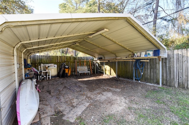 view of vehicle parking featuring a carport