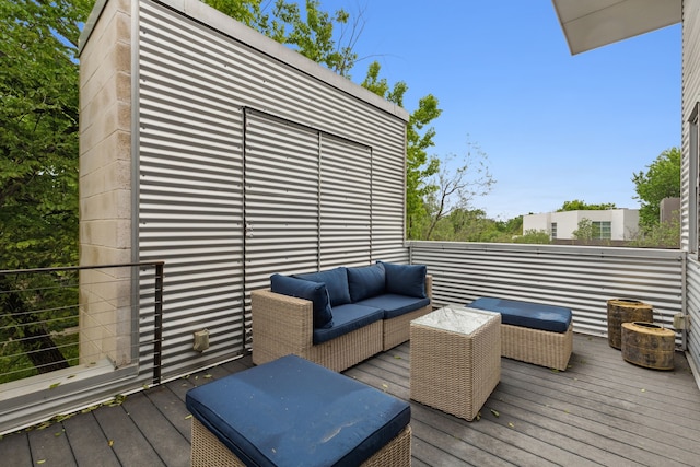 wooden terrace featuring an outdoor hangout area