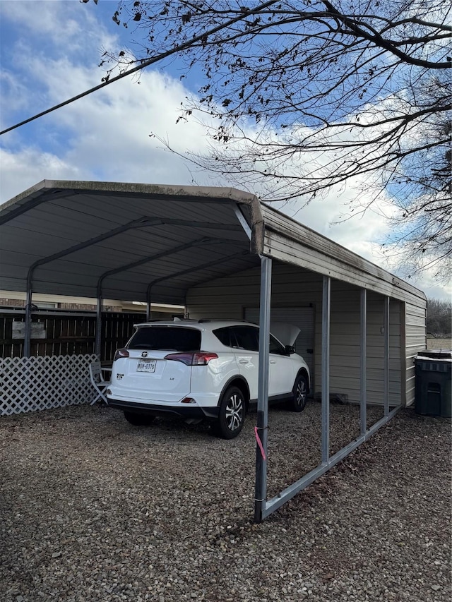 view of parking / parking lot with a carport