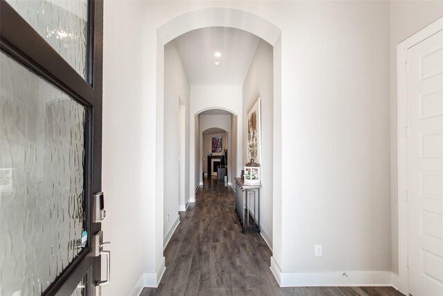 hallway featuring dark hardwood / wood-style floors