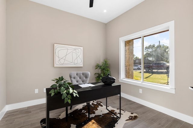 office featuring hardwood / wood-style floors and ceiling fan