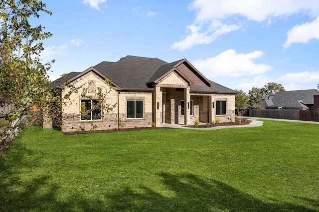 view of front of home featuring a front lawn