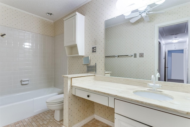 full bathroom featuring vanity, a textured ceiling, tile patterned floors, toilet, and tiled shower / bath