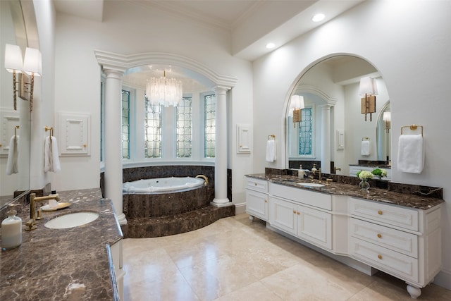 bathroom featuring crown molding, an inviting chandelier, a relaxing tiled tub, and vanity