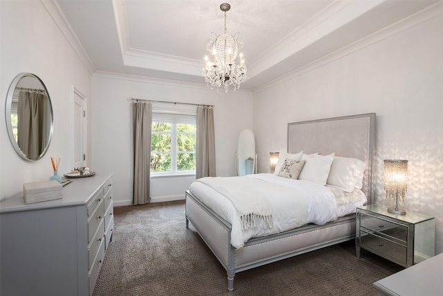 carpeted bedroom with a chandelier, a raised ceiling, and ornamental molding