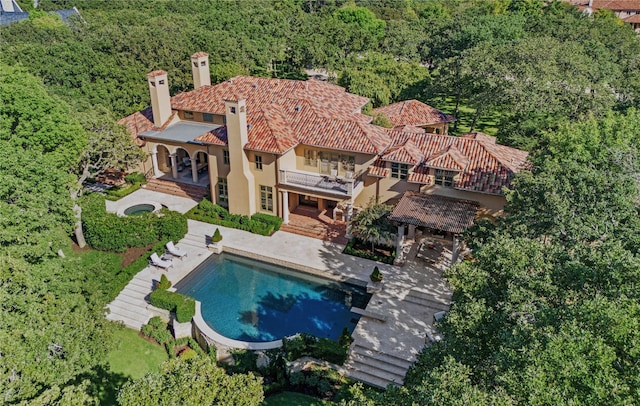 view of swimming pool with a gazebo and a patio