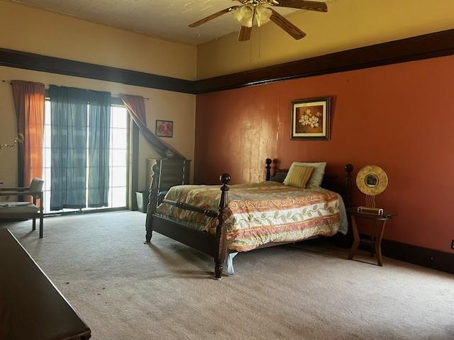 bedroom with carpet and ceiling fan