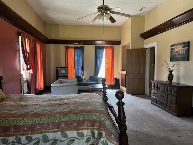 bedroom with carpet and ceiling fan