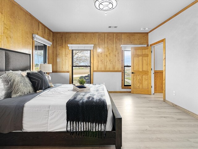 staircase with hardwood / wood-style floors and wood walls