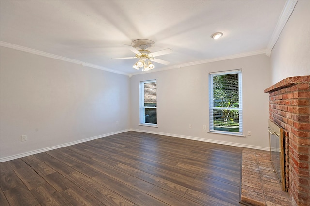 unfurnished living room with ceiling fan, a fireplace, dark hardwood / wood-style floors, and ornamental molding