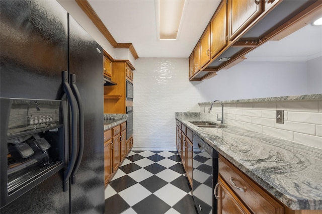 kitchen with light stone countertops, beverage cooler, crown molding, sink, and black appliances